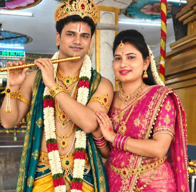 Lakshmi and Srinivas in traditional dress