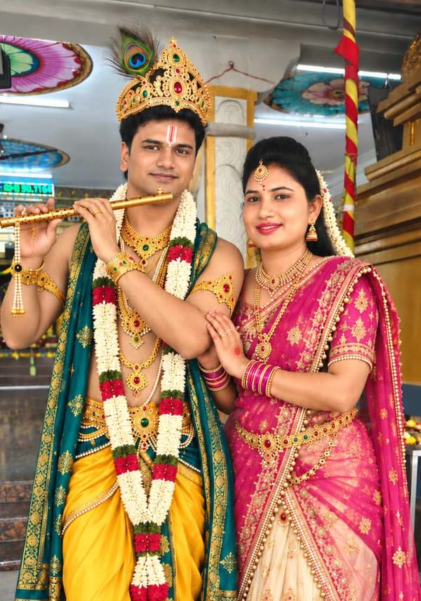 Lakshmi and Srinivas in traditional dress
